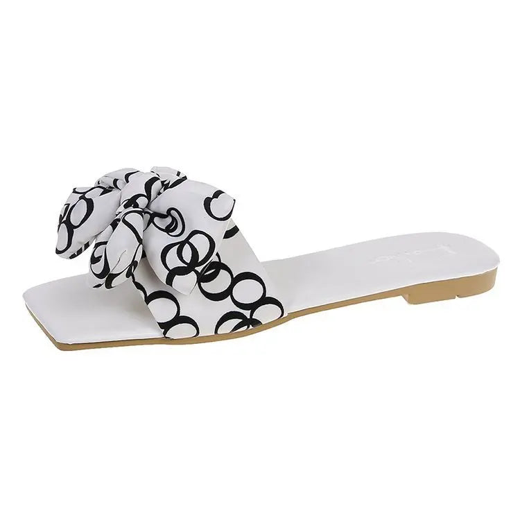 Slip on sandals footwear ladies shoe white bowtie black and white classic old money vibes shoes