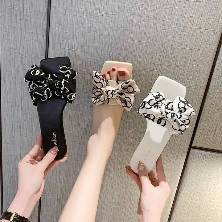 Slip on sandals footwear ladies shoe white bowtie black and white classic old money vibes shoes